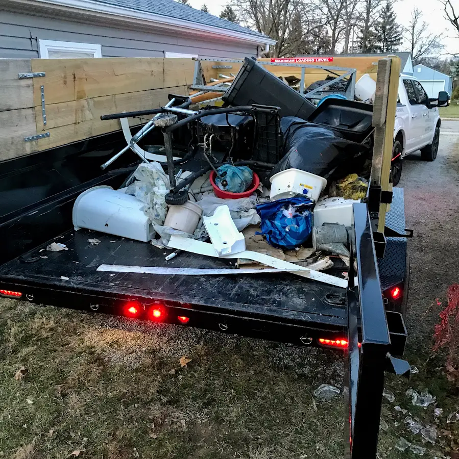 Roll-off dumpster delivered to a residential driveway in Fresno
